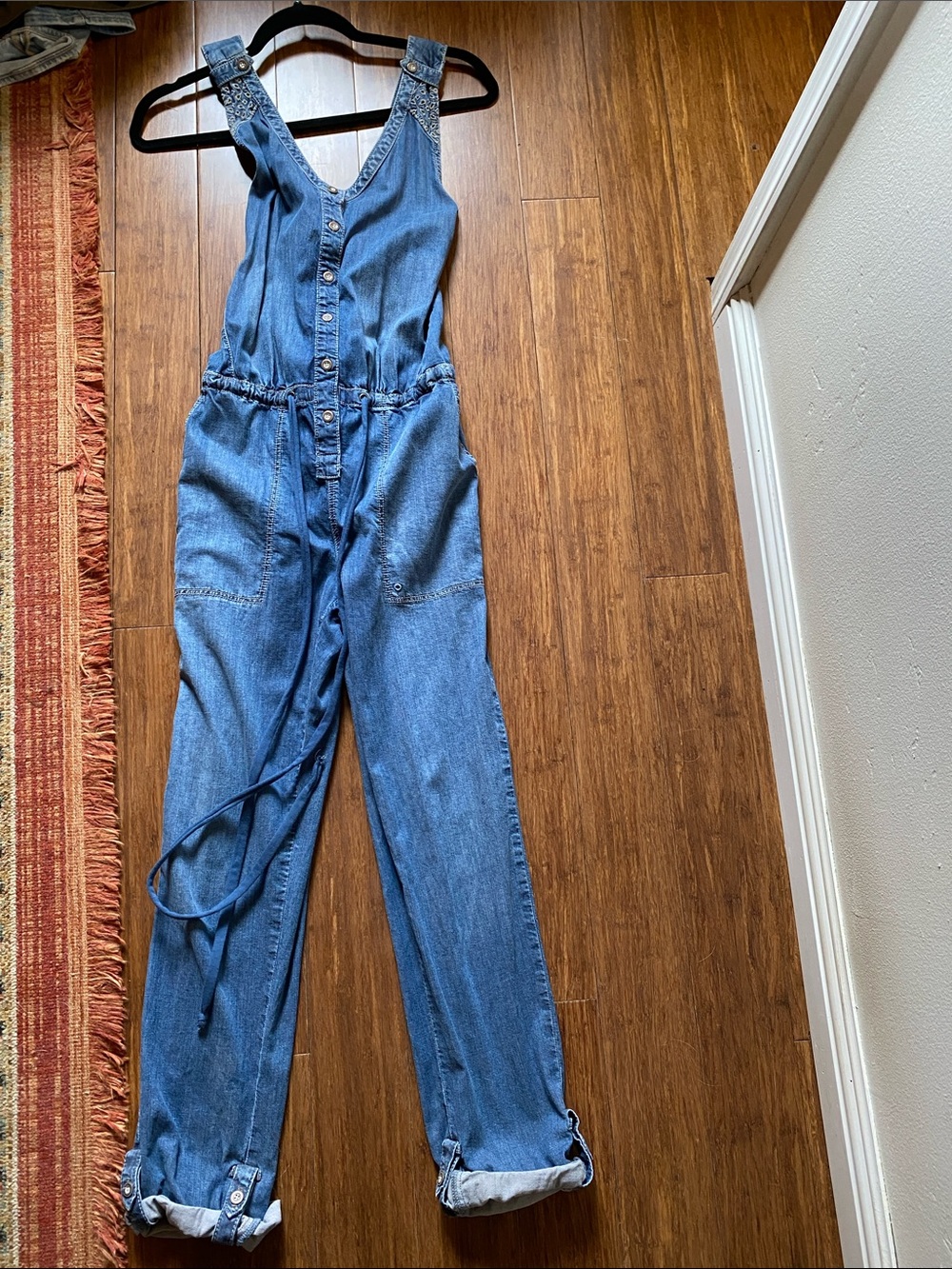 Anthropologie brand denim jumpsuit with tie waist